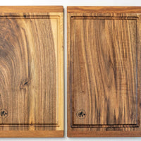 These steak cutting boards are handcrafted by Slovenian woodworker J. Gros and made from walnut wood, known for strength and durability. This large cutting board is ideal for comfortable chopping at home or in a professional kitchen. Its size and grain pattern also make it a great presentation or serving board.