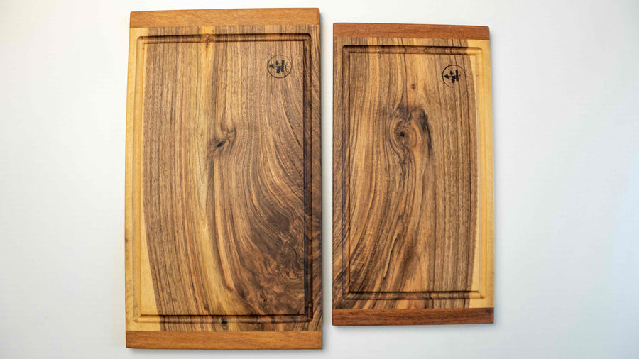 These steak cutting boards are handcrafted by Slovenian woodworker J. Gros and made from walnut wood, known for strength and durability. This large cutting board is ideal for comfortable chopping at home or in a professional kitchen. Its size and grain pattern also make it a great presentation or serving board.
