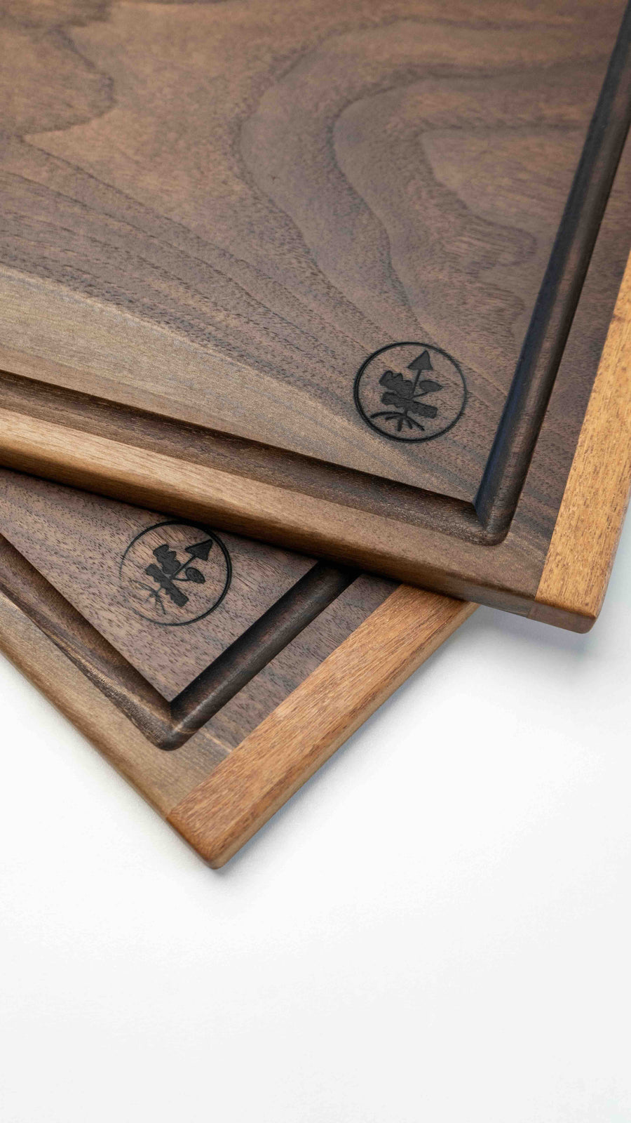 Handcrafted by Slovenian woodworker J. Gros, these cutting boards are made from American walnut, known for strength and durability. This extra large cutting board offers plenty of space for comfortable and lengthy chopping – either at home or in a professional kitchen. It also makes a great serving board.