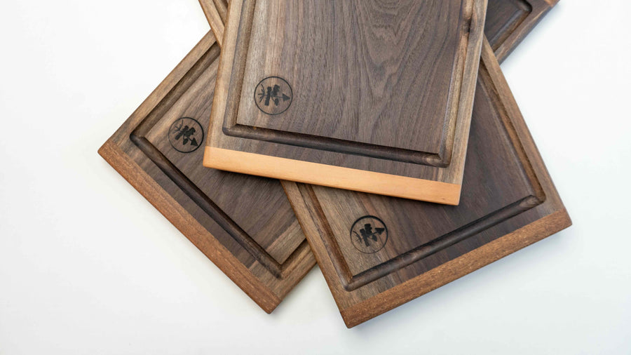These face grain cutting boards are handcrafted by local Slovenian woodworker J. Gros. They are made from American walnut (Juglans nigra), known for its strength, durability and color. This small steak cutting board fits on any countertop. Due to its striking surface, it can double as a serving or presentation board.