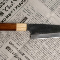 This Santoku Funayuki SUJ-2 blade is fitted with an octagonal rosewood handle with a cedar ferrule. Great for cutting smaller pieces of meat and filleting fish.  The blade is forged from SUJ-2 steel, which offers incredible capacities, hardness is 63-64 HRC, and at the same time the knife is very easy to resharpen. 