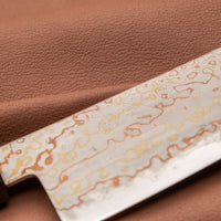 Hayabusa Gyuto Aogami #2 Rainbow Damascus is a versatile Japanese kitchen knife ideal for preparing meat, fish, and vegetables. Its blade, made of Aogami #2 steel, is thin and precise. It xcels in sharpness, edge retention, and ease of maintenance, but above all - looks - with the unique rainbow damascus pattern!