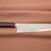 Hayabusa Gyuto Aogami #2 Rainbow Damascus is a versatile Japanese kitchen knife ideal for preparing meat, fish, and vegetables. Its blade, made of Aogami #2 steel, is thin and precise. It xcels in sharpness, edge retention, and ease of maintenance, but above all - looks - with the unique rainbow damascus pattern!