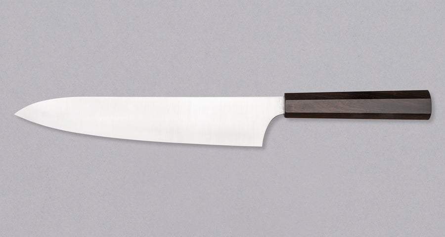 Full view of Hayabusa Gyuto Aogami Super Ebony 210 mm knife with ergonomic ebony wood handle, designed for comfort and control.
