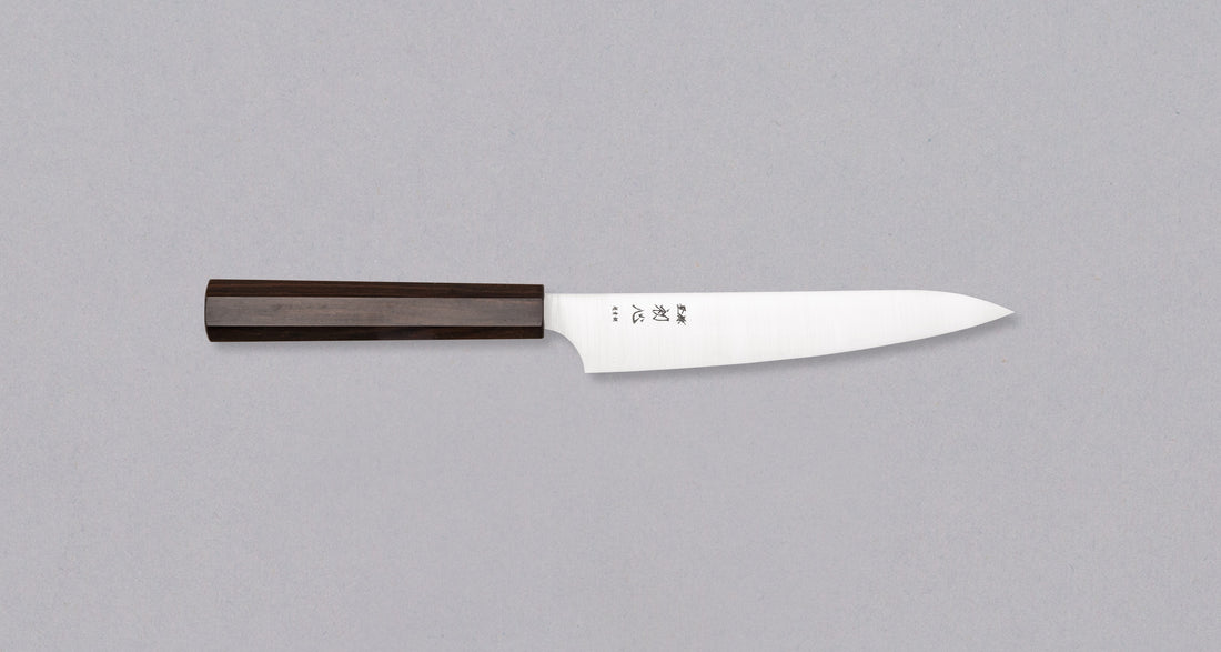 Hayabusa Petty Aogami Super Ebony 150 mm knife with a sleek migaki finish and elegant ebony handle.