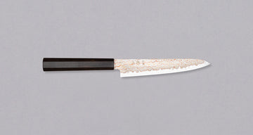 Hayabusa Petty Aogami #2 Rainbow Damascus 150mm is a versatile Japanese kitchen knife ideal for preparing meat, fish, and vegetables. Its blade, made of Aogami #2 steel, is thin and precise. It excels in sharpness, edge retention, and ease of maintenance, but above all looks - with the unique rainbow damascus pattern!