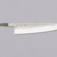 Hokiyama Gyuto 440C Damascus in 210mm (8.3") blade length is the Japanese version of the classic Western Chef’s knife. It comes without a handle, so you can choose and fit your own! It's made from 440C stainless steel and is low maintenance—both in rust resistance and long-term edge retention. Makes a great gift!