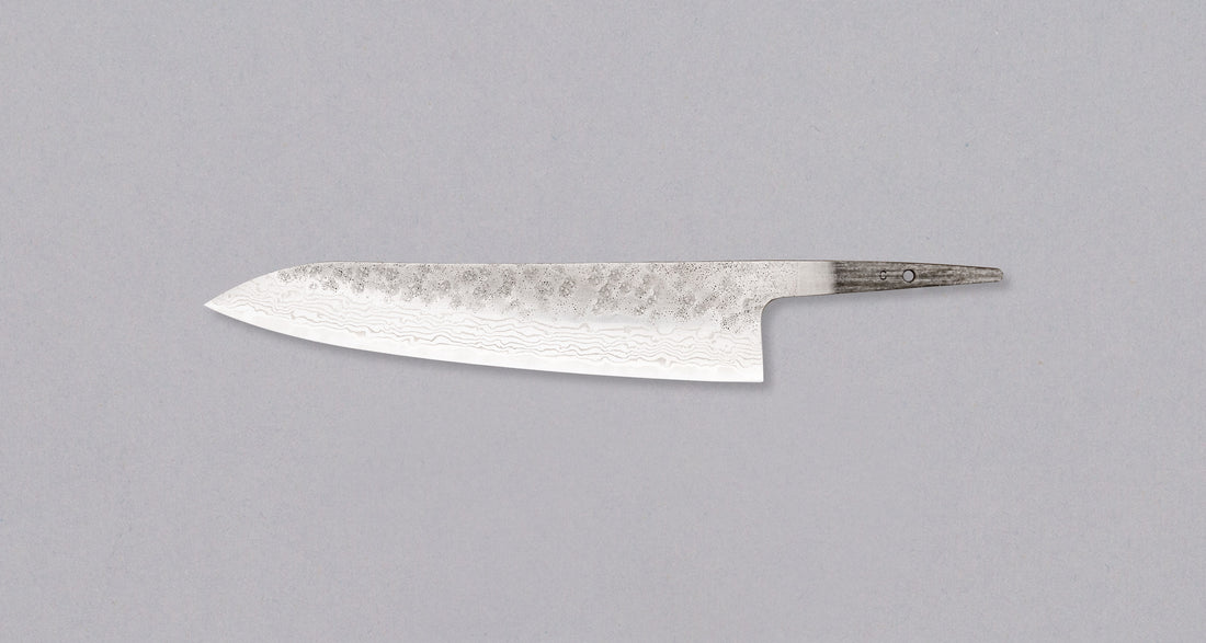 Hokiyama Gyuto 440C Damascus in 210mm (8.3") blade length is the Japanese version of the classic Western Chef’s knife. It comes without a handle, so you can choose and fit your own! It's made from 440C stainless steel and is low maintenance—both in rust resistance and long-term edge retention. Makes a great gift!