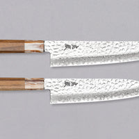  The Kotetsu VG-10 Damascus Set offers great versatility, featuring two multi-purpose knives that can cover most cutting tasks in the kitchen. With visible hammer prints, a damascus pattern, and a classic Japanese (wa-style) teak handle, they will impress anyone who appreciates aesthetically designed kitchen utensils.
