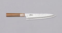 The Kotetsu Gyuto VG-10 Damascus 210mm (8.2") is a large multi-purpose Janapese knife with visible hammer prints, a damascus pattern and a classic Japanese (wa-style) teak handle. It will impress anyone who appreciates aesthetically designed kitchen utensils.