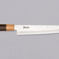 The Kotetsu Sujihiki VG-10 Damascus 240mm (9.5") is a long and narrow Japanese slicer with visible hammer prints, a damascus pattern, and a classic Japanese (wa-style) pakka wood handle. It will impress anyone who appreciates aesthetically designed kitchen utensils.