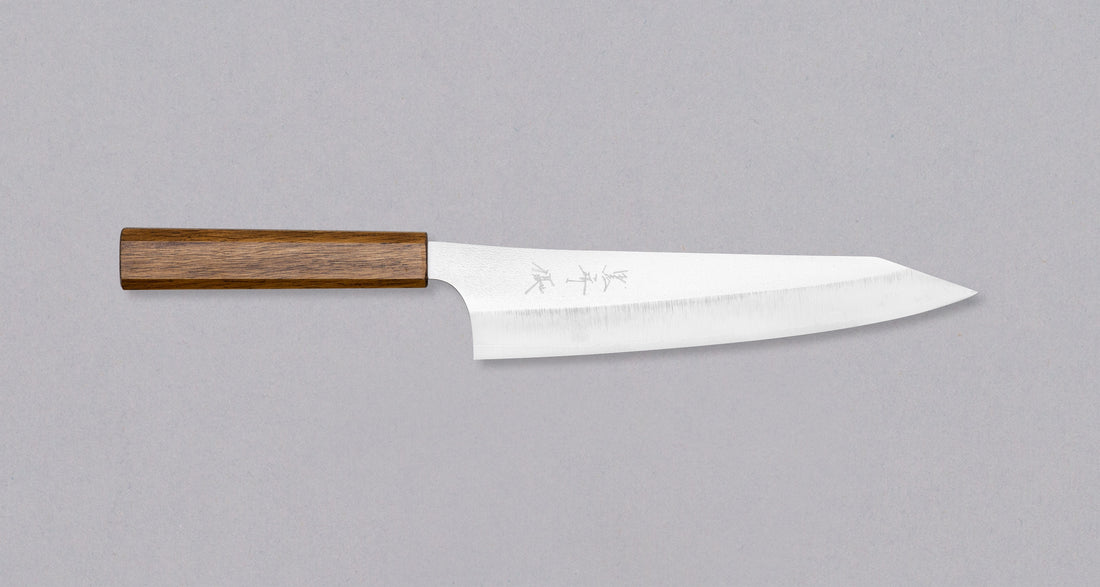 Kurosaki Gyuto Gekko VG-XEOS Migaki 210mm (8.3")_1  Kurosaki Gyuto from the Gekko line is made by master blacksmith Yu Kurosaki. The minimalistic, lightweight, perfectly balanced blade is treated to a high polish − hence the name Gekkō (月光) which means moonlight in Japanese. VG-XEOS steel (61 HRC), which has excellent resistance to wear and corrosion.