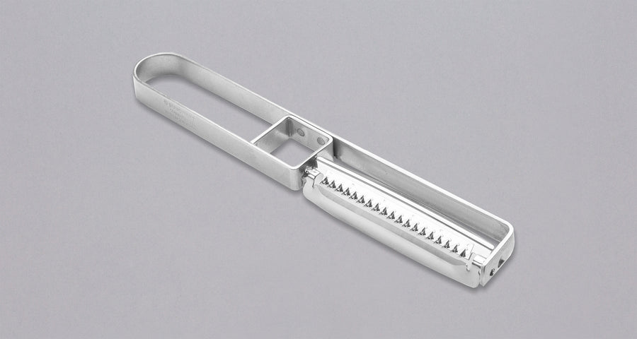 This medium version of the Julienne peeler, SSK-13, from Japanese manufacturer Suncraft is made of very sharp, precise, and thin stainless steel.  A Julienne peeler is a quick and safe tool for making thin julienne strips of vegetables, especially harder veggies like carrots, zucchini, potatoes, sweet potatoes, etc. Great for making garnishes, salad toppings, stir-fries, potato hash browns, citrus zest, and more.  Total length: 190mm (7.5")