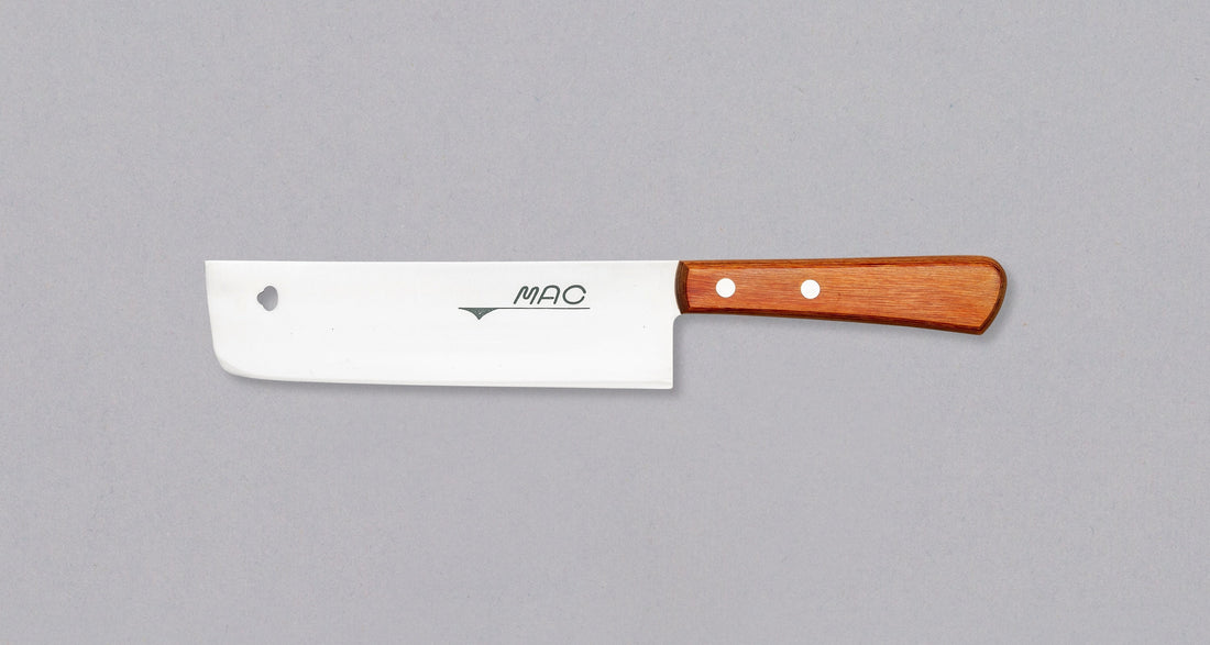 The MAC Nakiri 165 mm is a traditional Japanese knife specially designed for cutting vegetables. The blade is made of MAC molybdenum steel and has an ergonomic rosewood western handle. These features make the MAC Nakiri 165mm knife suitable as a first Japanese knife for all vegetable lovers and also a great gift.