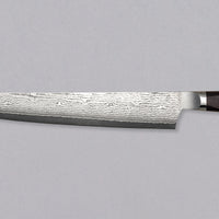 Mcusta Slicer VG-10 Black Damascus 270mm (10.6") with a core from stainless VG-10 steel is fitted with a pakka wood handle. Excellent sujihiki knife for long and precise cuts of meat and fish, a rare piece by the Mcusta Zanmai smithy. The 33-layer black Damascus pattern is unique to each blade, making it one of a kind.