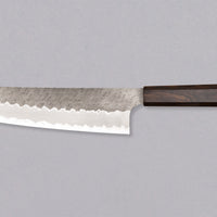 Nigara Kiri-Gyuto AS Migaki Tsuchime is a multi-purpose Japanese kitchen knife, suitable for preparing meat, fish and vegetables. Due to its easy-to-resharpen Aogami Super steel core (63 HRC) it keeps sharp for a long time. The beautiful combination of tsuchime, migaki and kasumi finishes makes this blade functional art.