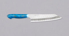 Nigara Kiritsuke-Gyuto SG2 Tsuchime is a multi-purpose Japanese kitchen knife, suitable for preparing meat, fish, and vegetables. Its SG2 powder steel core ensures long-lasting sharpness with little to no maintenance, as the steel resists corrosion very well. Browse our large selection of handcrafted Japanese knives!