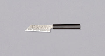 Nigara Kiri-Petty AS Migaki Tsuchime is a small multi-purpose Japanese kitchen knife, suitable for meat, fish and vegetables. Due to its easy-to-resharpen Aogami Super steel core (63 HRC) it keeps sharp for a long time. The beautiful combination of tsuchime, migaki and kasumi finishes makes this blade functional art.