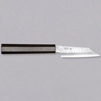 Nigara Kiri-Petty SG2 Migaki Tsuchime Wa Ebony is a small Japanese kitchen knife, intended for all those smaller tasks where larger and wider knives are deemed unwieldy. Its core is made of SG2 powder steel, ensuring long-lasting sharpness while requiring minimal maintenance. Fitted with a luxurious dark ebony handle.