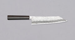 Nigara Kiritsuke Gyuto VG-10 Damascus Tsuchime 240mm (9.4") is a multi-purpose Japanese kitchen knife, suitable for preparing meat, fish, and vegetables. VG-10 stainless steel ensures a fine sharpness with little to no maintenance. As such, the knife is also suitable as a first Japanese knife or gift. Fitted with an ebony handle.