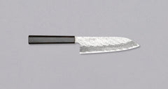 Nigara Santoku VG-10 Damascus Tsuchime is a multi-purpose Japanese kitchen knife, suitable for preparing meat, fish, and vegetables. Its VG-10 stainless steel core ensures a fine sharpness with little to no maintenance. As such, the knife is also suitable as a first Japanese knife or gift. Fitted with ebony handle.