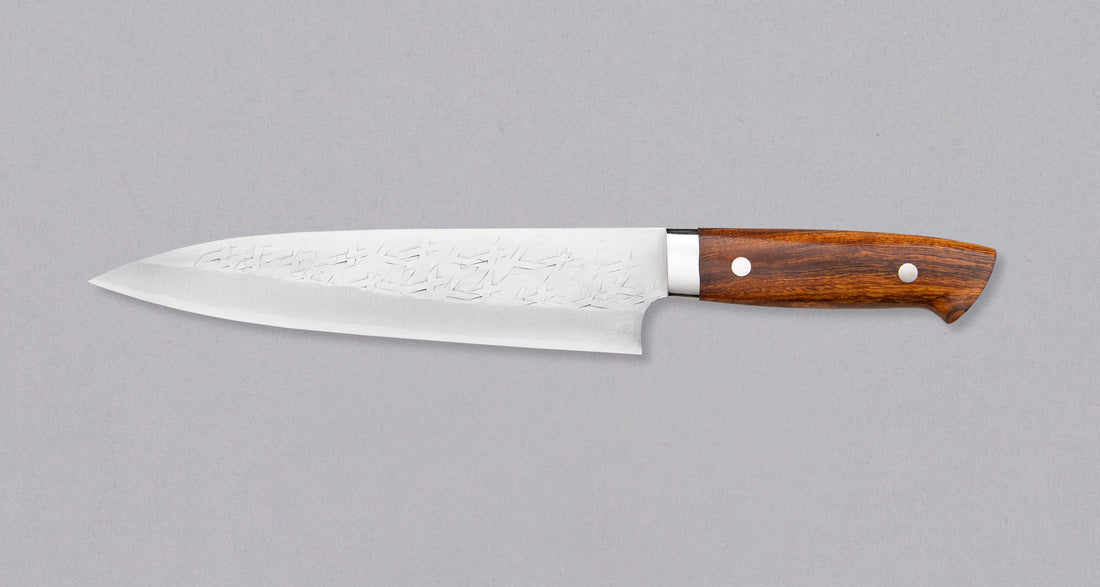 Saji Gyuto SRS13 Tsuchime 240mm (9.4") is a multi-purpose Japanese kitchen knife, suitable for preparing meat, fish, and vegetables. It’s a truly out-of-this-world piece of knifemaking. Its heart was forged out of SRS13, a high-speed powder steel, renowned for its high hardness and excellent corrosion resistance.