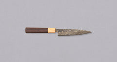 The Saji Petty VG-10 Gold RWO 135 mm is a small Japanese kitchen knife suitable for preparing meat, fish and vegetables. However, it would be an injustice to call it just a kitchen knife, as it is a remarkable example of blacksmith's craftsmanship - from its unique design to its very specific features.