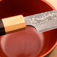 The Saji Petty VG-10 Gold RWO 135 mm is a small Japanese kitchen knife suitable for preparing meat, fish and vegetables. However, it would be an injustice to call it just a kitchen knife, as it is a remarkable example of blacksmith's craftsmanship - from its unique design to its very specific features.