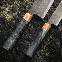 The Senzo Dawn Limited Edition Petty SG2 150mm (5.9") is a small multi-purpose Japanese knife, hand-made in the Japanese smithy Suncraft. It's a stunning collector's item. The knife is fitted with a traditional Japanese octagonal handle topped with a special ferrule made from the wood of a 300-year-old holy oak tree.