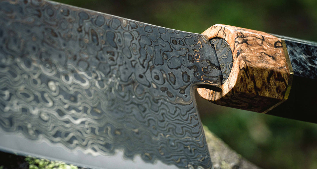 The Senzo Dawn Limited Edition Gyuto SG2 200mm (7.9") is a multi-purpose Japanese knife, hand-made in the Japanese smithy Suncraft. It's a stunning collector's item. The knife is fitted with a traditional Japanese octagonal handle topped with a special ferrule made from the wood of a 300-year-old holy oak tree.