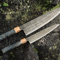 The Senzo Dawn Limited Edition Petty SG2 150mm (5.9") is a small multi-purpose Japanese knife, hand-made in the Japanese smithy Suncraft. It's a stunning collector's item. The knife is fitted with a traditional Japanese octagonal handle topped with a special ferrule made from the wood of a 300-year-old holy oak tree.