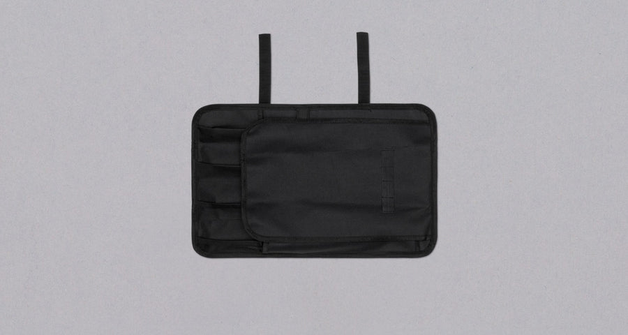 Our SharpEdge Black Chef's Knife Roll is best suited for chefs on-the-go and home cooks who need a small knife roll that can still hold very long knives (up to 440mm (17.3")). It has 4 pockets for knives and utensils, and additional velcro fasteners to keep them in place. A minimalistic, durable black knife bag.