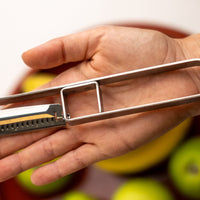 This medium version of the Julienne peeler, SSK-13, from Japanese manufacturer Suncraft is made of very sharp, precise, and thin stainless steel.  A Julienne peeler is a quick and safe tool for making thin julienne strips of vegetables, especially harder veggies like carrots, zucchini, potatoes, sweet potatoes, etc. Great for making garnishes, salad toppings, stir-fries, potato hash browns, citrus zest, and more.  Total length: 190mm (7.5")