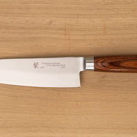 Tamahagane San Santoku in 160mm (6.3") blade length is a universal knife that will excel at a variety of cutting and chopping on a cutting board. A polished blade finish, featured with the core VG-5 steel hardened to 61 HRC.