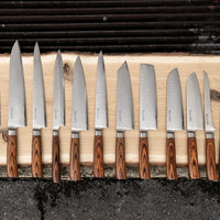 Tamahagane Tsubame Slicer knife is primarily intended for long pulls and precise cuts of meat and fish. The 240mm (9.5") version is designed for medium-sized fish and pieces of meat. A matte blade finish, featured with the core VG-5 steel hardened to 61 HRC. Pictured: Set of Tamahagane knives we currently have available. Perfect to assemble your own personal set