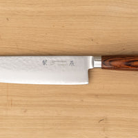 Tamahagane Nakiri is a traditional Japanese knife with a square, thin blade and a deep, flat belly. Perfect knife for cutting vegetables. A matte blade finish, featured with the core VG-5 steel hardened to 61 HRC.