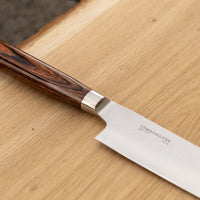 Tamahagane Tsubame Slicer knife is primarily intended for long pulls and precise cuts of meat and fish. The 210mm (8.3") version is the shortest of the slicers, designed for small to medium-sized fish and pieces of meat. A matte blade finish, featured with the core VG-5 steel hardened to 61 HRC.