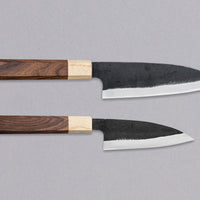 Meet your new favorite power couple - The Carbons. The set consists of Yoshida Ajikiri 100mm (3.9") and Yoshida Santoku Funayuki 155mm (6.1"). Small yet fierce, these two hand-forged knives are made from high-carbon SUJ-2 steel (63-64 HRC), known for its fine sharpness, long edge retention, and ease of sharpening. 