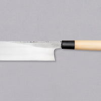 Kakugata Usuba is forged from Shirogami #1, one of the purest and most traditional steels used in Japanese knife manufacturing. Fitted with a traditional Japanese handle made of magnolia wood topped with a buffalo horn ferrule, this minimalistic knife showcases the qualities of traditional Japanese blades we like most.