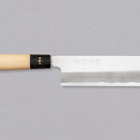 Kakugata Usuba is forged from Shirogami #1, one of the purest and most traditional steels used in Japanese knife manufacturing. Fitted with a Japanese handle made of magnolia wood topped with a buffalo horn ferrule, this minimalistic knife showcases the qualities of traditional Japanese blades we like most.