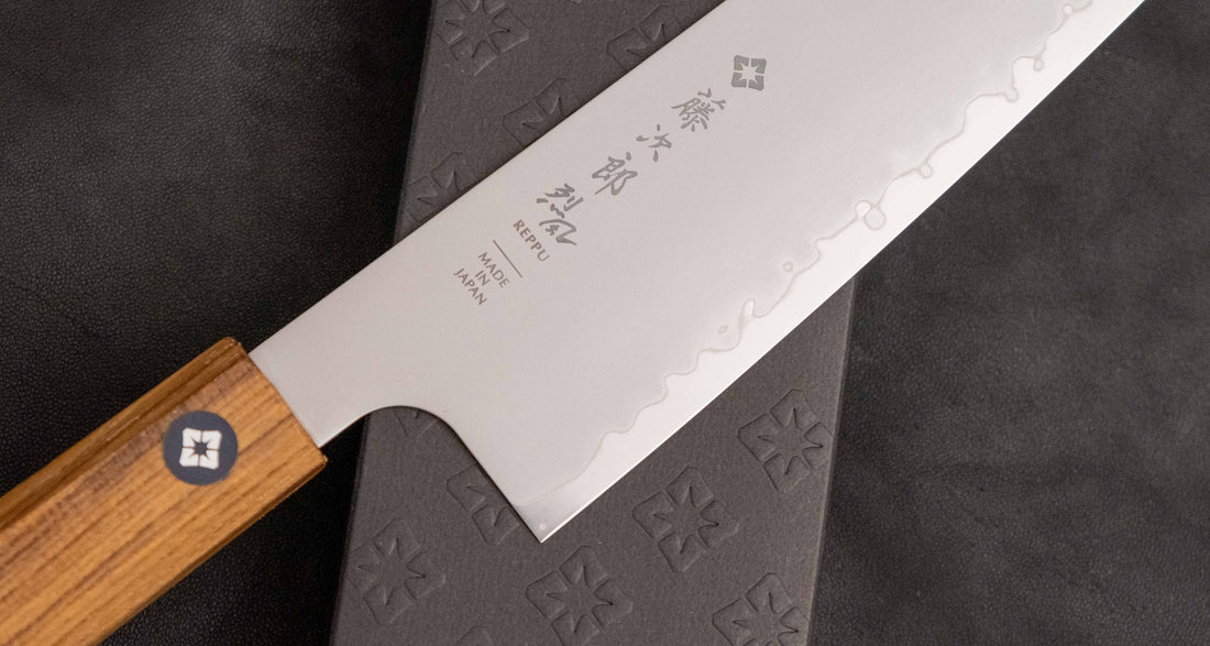 Tojiro Kiritsuke Gyuto Reppu SG2 210 mm knife with elegant migaki finish and rounded belly for versatile kitchen tasks.