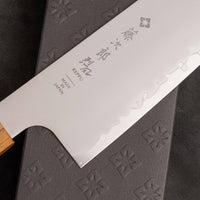 Tojiro Kiritsuke Gyuto Reppu SG2 210 mm knife with elegant migaki finish and rounded belly for versatile kitchen tasks.