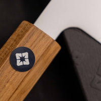 NFC sticker on the Tojiro Petty Reppu SG2 150 mm knife handle for authenticity verification and product details.