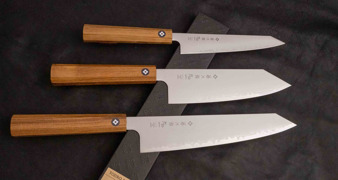 A stunning set of Tojiro Reppu SG2 knives, including Bunka, Petty, and Gyuto, showcasing their elegant design, superior SG2 powder steel craftsmanship, and versatile functionality for diverse kitchen tasks.