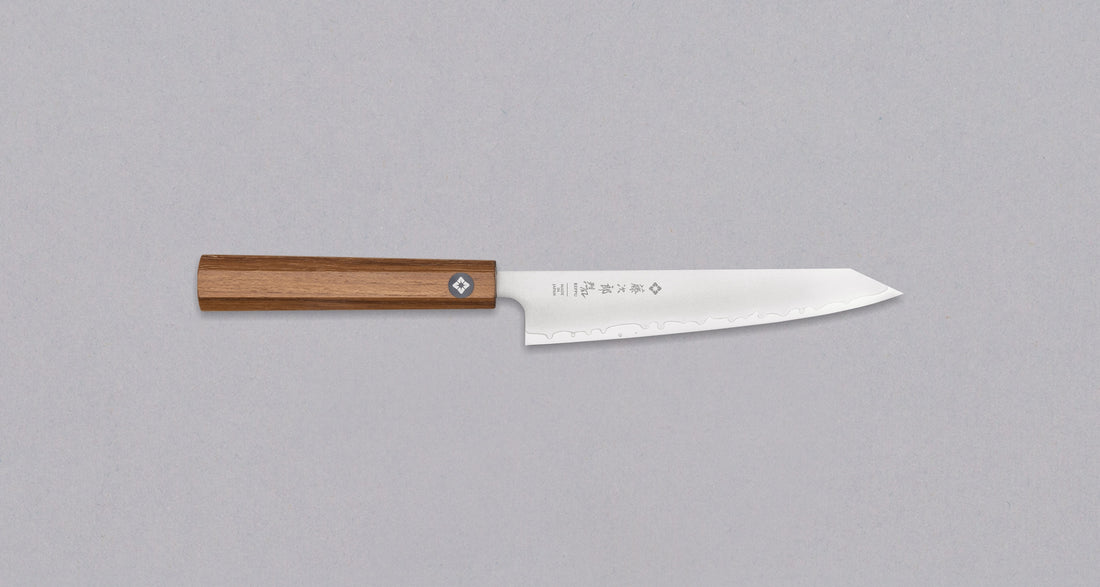 Tojiro Petty Reppu SG2 150 mm knife with SG2 powder steel core and a durable teak wood handle, ideal for precise kitchen tasks.