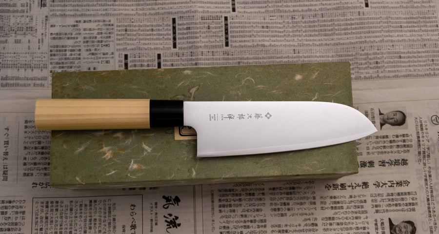 Tojiro Santoku Zen in 165mm is a great choice if you're looking for a handy, multi-purpose, low-maintenance knife that is very affordable. Stainless steel, traditional Japanese magnolia wood handle, minimalist blade finish - enjoy the classic Japanese aesthetic.