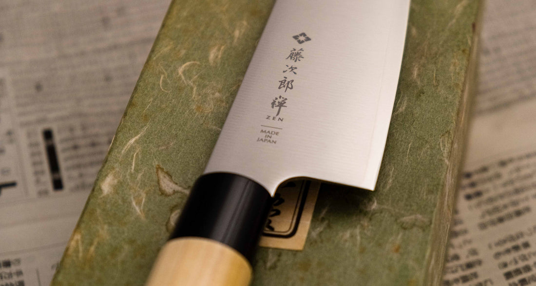 Tojiro Santoku Zen in 165mm is a great choice if you're looking for a handy, multi-purpose, low-maintenance knife that is very affordable. Stainless steel, traditional Japanese magnolia wood handle, minimalist blade finish - enjoy the classic Japanese aesthetic.