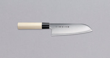 Tojiro Santoku Zen 165mm (6.5")_1
Tojiro Santoku Zen in 165mm is a great choice if you're looking for a handy, multi-purpose, low-maintenance knife that is very affordable. Stainless steel, traditional Japanese magnolia wood handle, minimalist blade finish - enjoy the classic Japanese aesthetic.