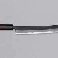 The Tsunehisa Sakimaru Sujihiki Aogami #2 300mm is a traditional Japanese knife used for preparing meat and fish, especially for sashimi and nigiri sushi. The name sakimaru refers to the tanto tip, which is one of the main features of a katana.