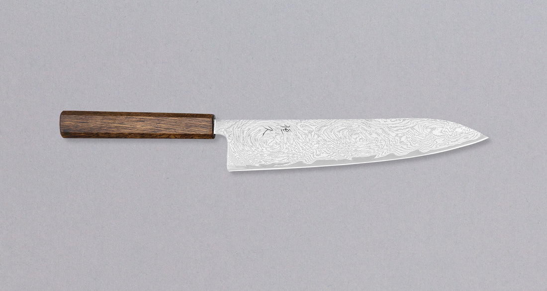 Tsunehisa Gyuto AUS-10 Nami 240mm is a multi-purpose Japanese kitchen knife, suited for preparing meat, fish and vegetables. It’s a great choice for those looking for a knife with a bit more blade real estate. AUS-10 steel is a no-fuss stainless steel with a fine sharpness and great edge retention.